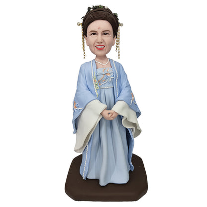 clay bobble head